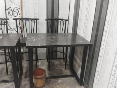 6 Month use furniture available 2 table 8 chairs