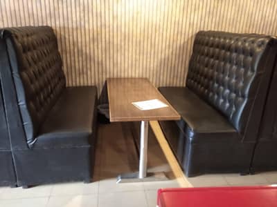 Comfortable Black Tufted Sofa with Table - Good Condition