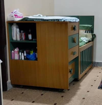 baby cot with changing table