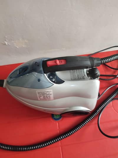 Bissell Netherlands Hand Held Steam Cleaner with Accessories
