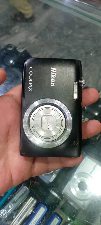 Nikon digital camera with battery cherger