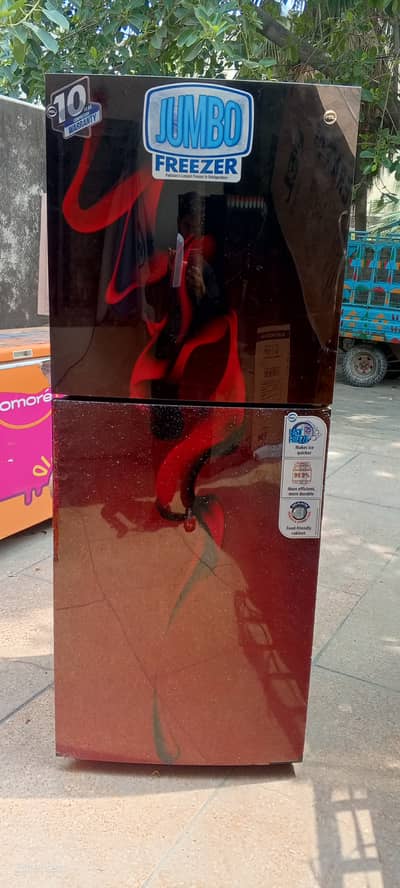 Pel refrigerator with glass door wide space.