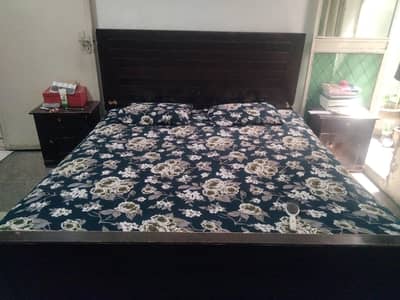 wooden bed with strong structure and two size tables