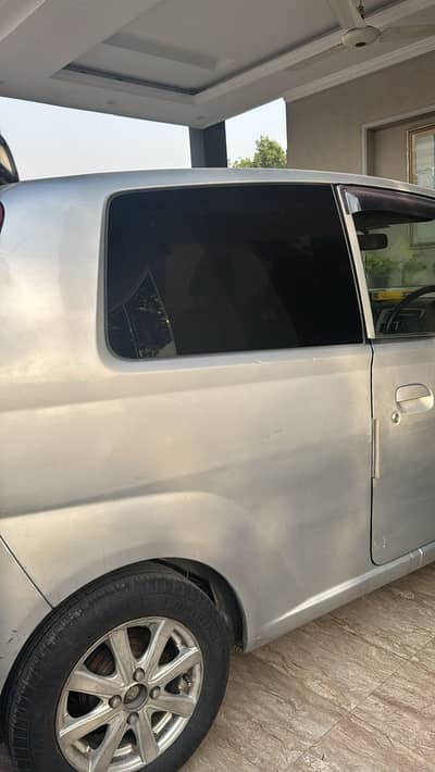 Daihatsu Mira 2006