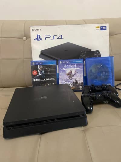 PS4, PlayStation 4 Slim, 1TB with box, 2 controllers and game