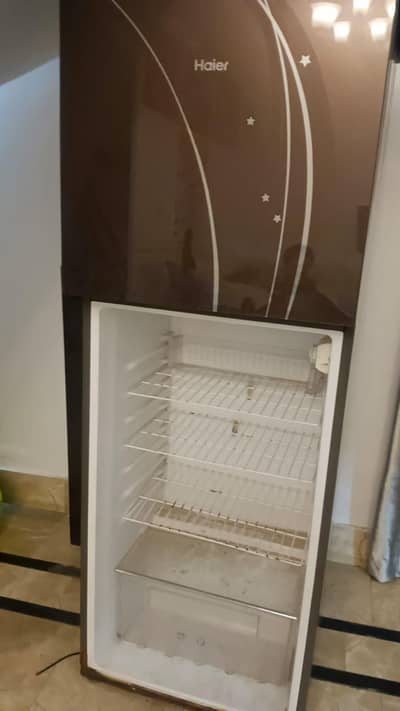 Haier Glass door Fridge HRF-336 Available for sell need door repair