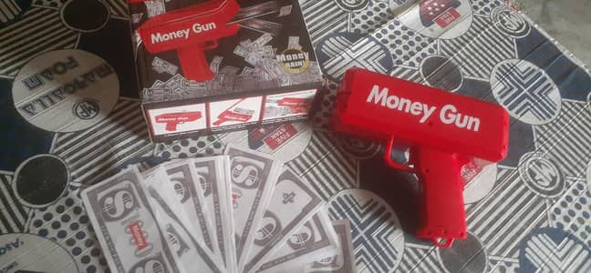 money gun with 100 money notes for kids