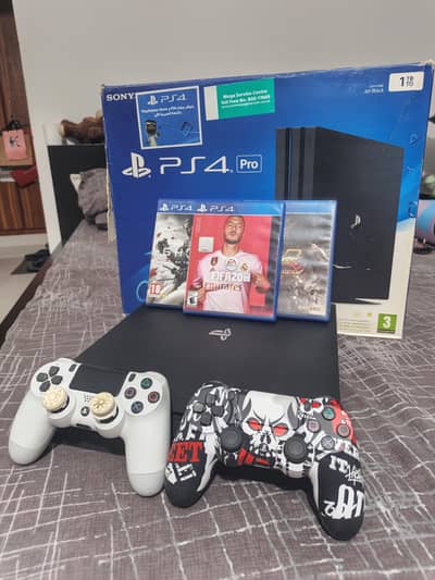 Ps4 PRO 1TB WITH BOX AND GAMES FOR SALE