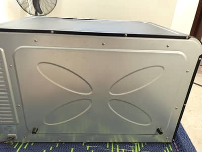 signature oven with 12 inches pizza tary very good condition just like