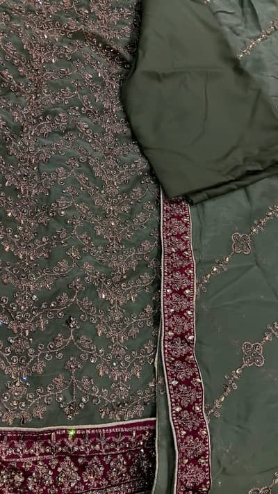 Kari suit in green n maroon.
