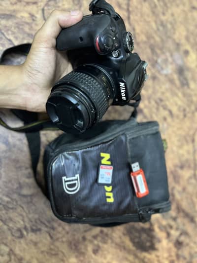 Nikon D3400 with lens battery and bag