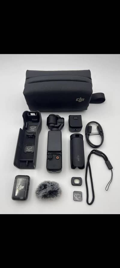 DJI osmo pocket 3 camera,mic,betteries,stand,combo acceries,carry bag