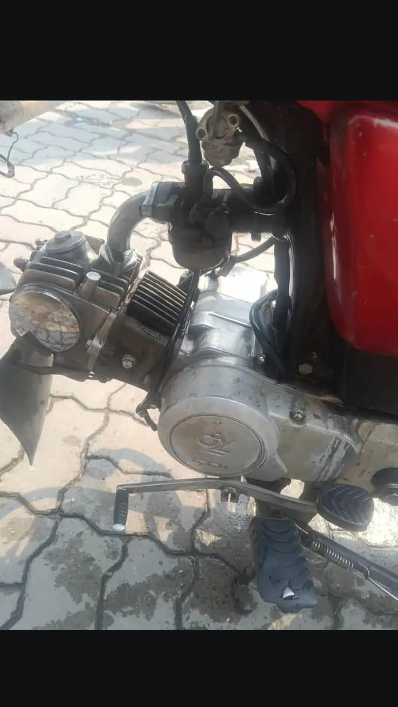 Dhoom 70 cc 5
