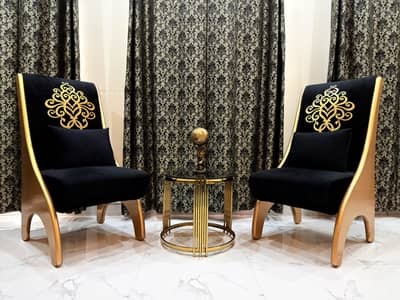 Two Lounge Chairs with round classic table