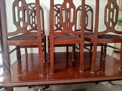 pure wooden dining table with pure wooden chairs