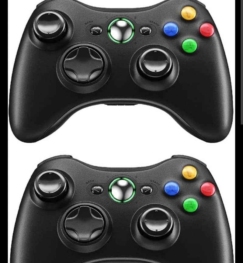 Xbox 360 with two wireless controllers 0