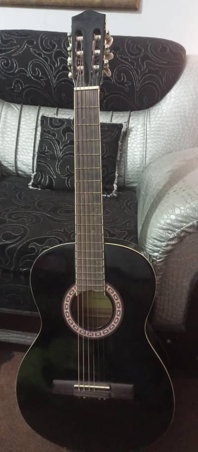 black acoustic guitar