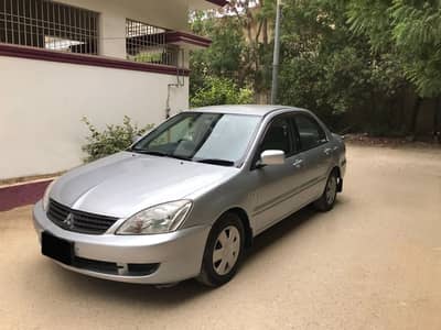 Mitsubishi Lancer GLX Reg 2012. . Japanese. . Extraordinary Mint Condition