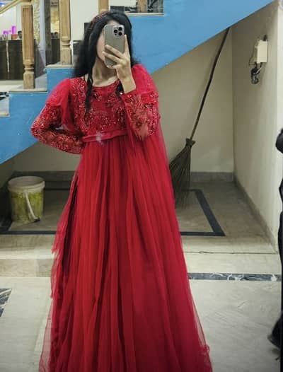 Fresh Red maxi with  wide  flare. peeti with cutdana. flare with net fab