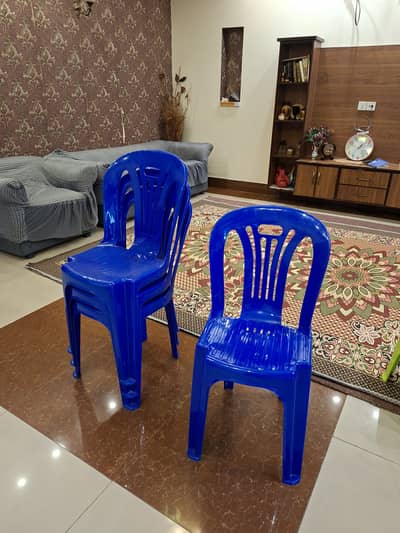 Set of 4 Blue Plastic Chairs in Excellent Condition