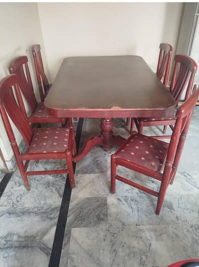 6 chairs and one table for sale in good confition