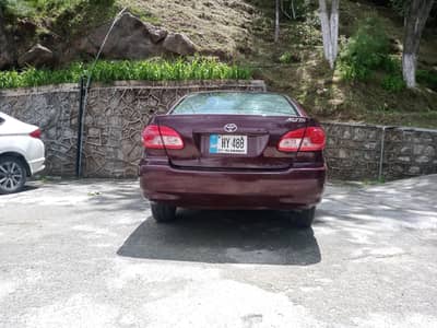 Toyota Corolla Altis 2006 red wine color