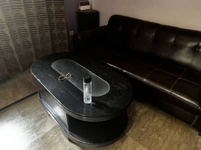 Leather sofa with wood table