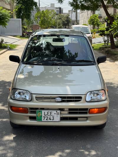Daihatsu Coure 2008 automatic  Golden color