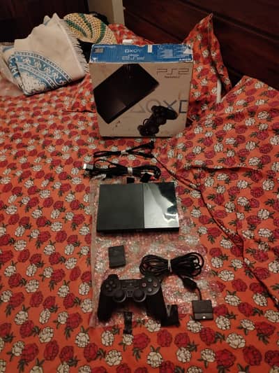 PS2 10/10 Condition with Box, 10 Games & Accessories