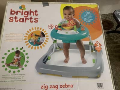 Bright star walker excellent condition with box