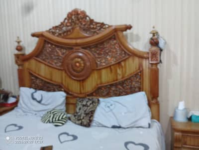 Bed with side tables and dressing table