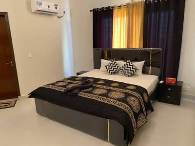 Two bedroom apartment four rent available Gulbug green Islamabad Ialamabad lukurya furnished apartment family building