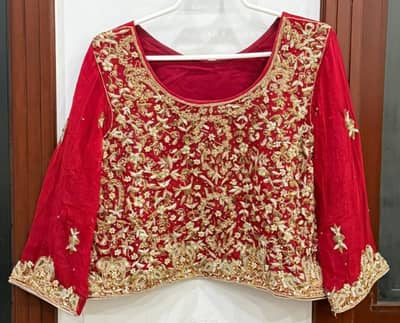 Bridal lehnga choli and dupatta with pouch and jewellery set