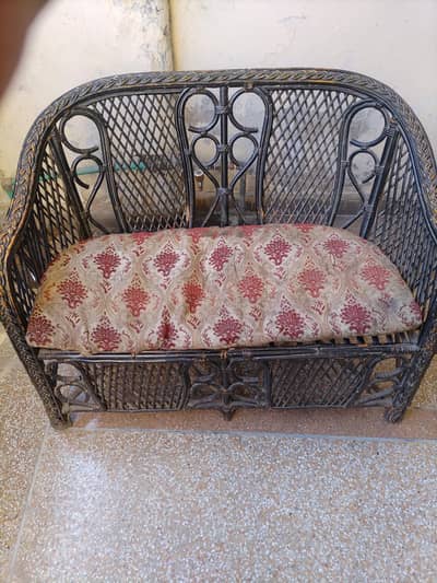 Cane sofa 2 seater with cushion seat.