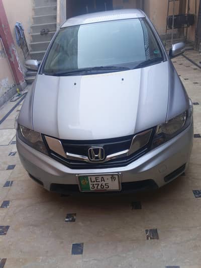 Honda City IVTEC  Silver colour Brand new just 24000 Drive