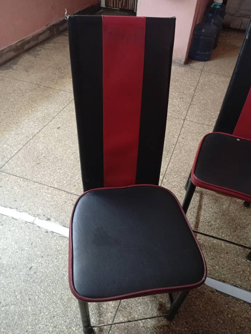 Dining table 4 chairs 10 by 10 condition ,very good condition 2