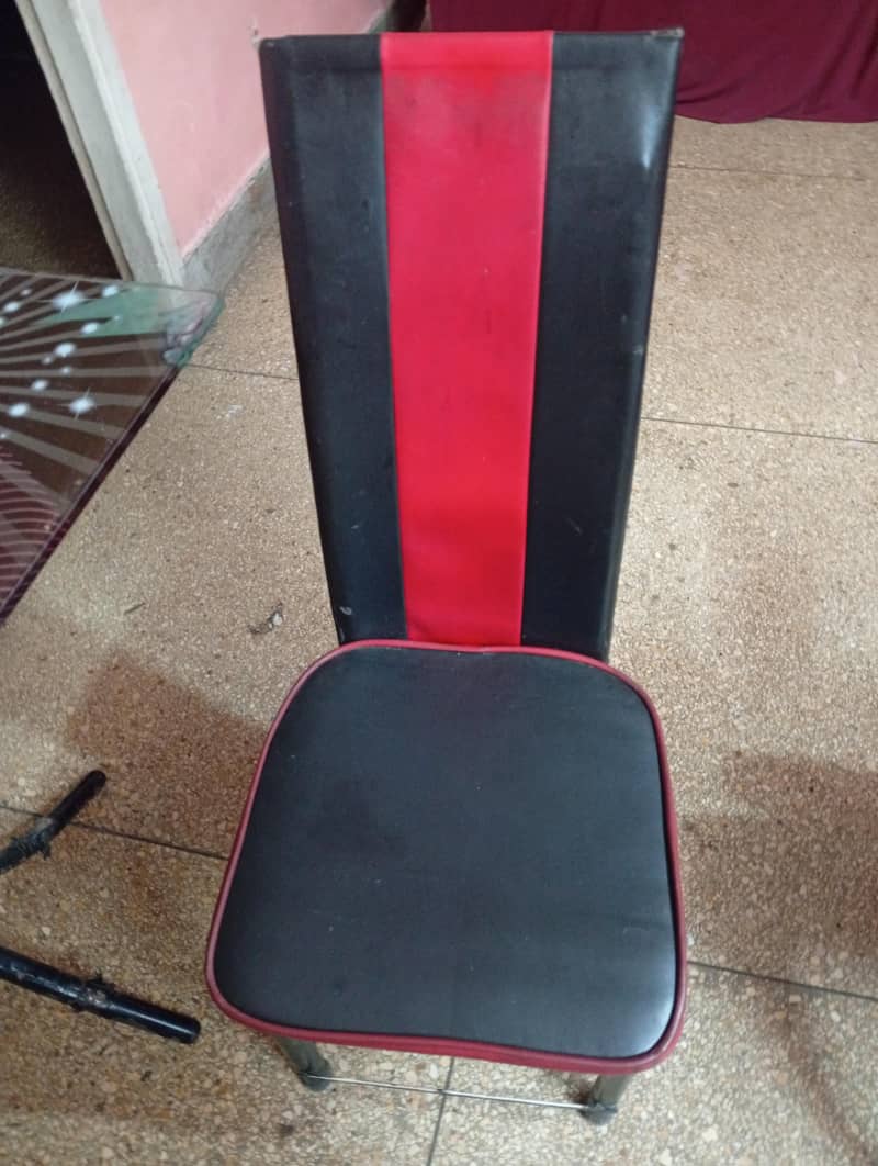 Dining table 4 chairs 10 by 10 condition ,very good condition 3