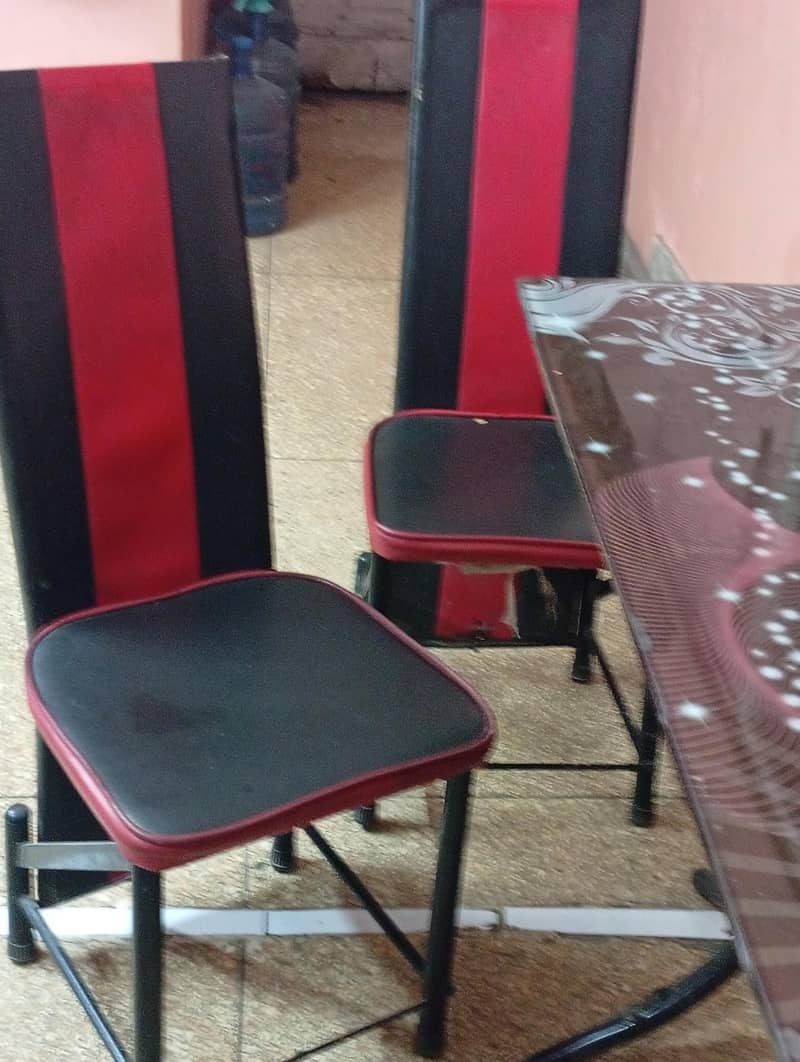 Dining table 4 chairs 10 by 10 condition ,very good condition 5