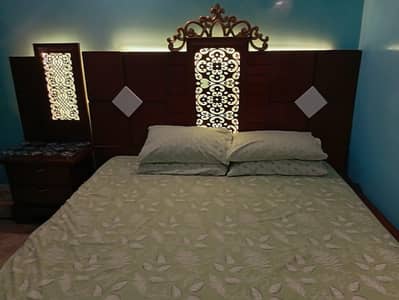 Wood bed with 2 side tables , 3 Almira , and 1 dressing table and Bed