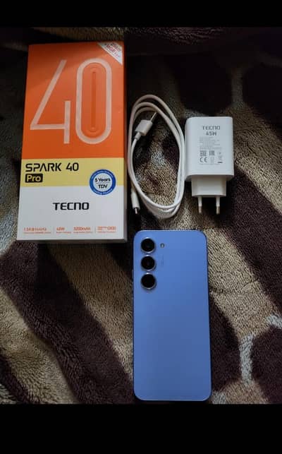 Tecno spark 40 pro 7 months warranty left with box and charger
