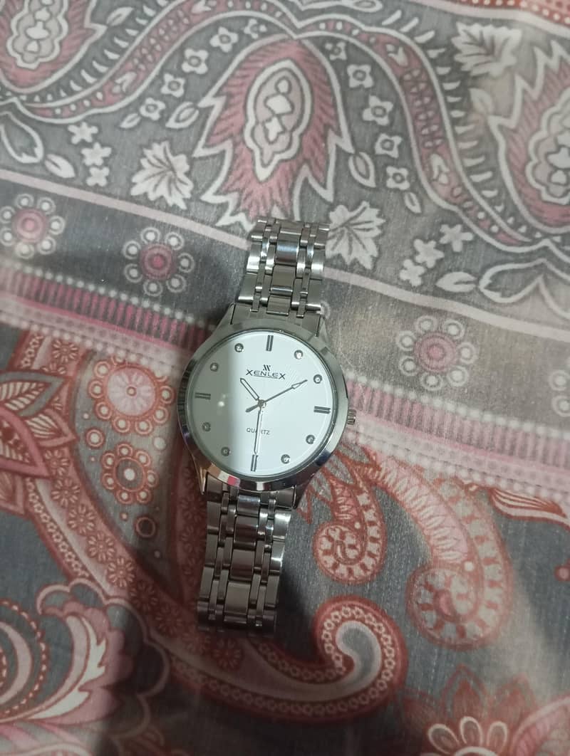 silver watch 0