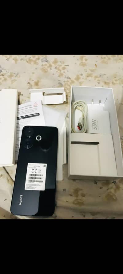 redmi 13 mobile with complete box phone new condition