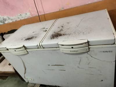 sales waves freezer slitly used