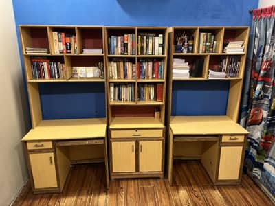 Large wooden study table with shelves