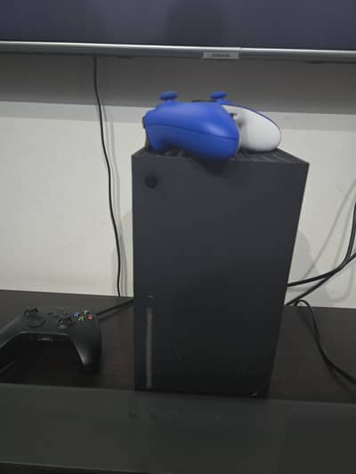 xbox series x in excellent condition with one extra controller
