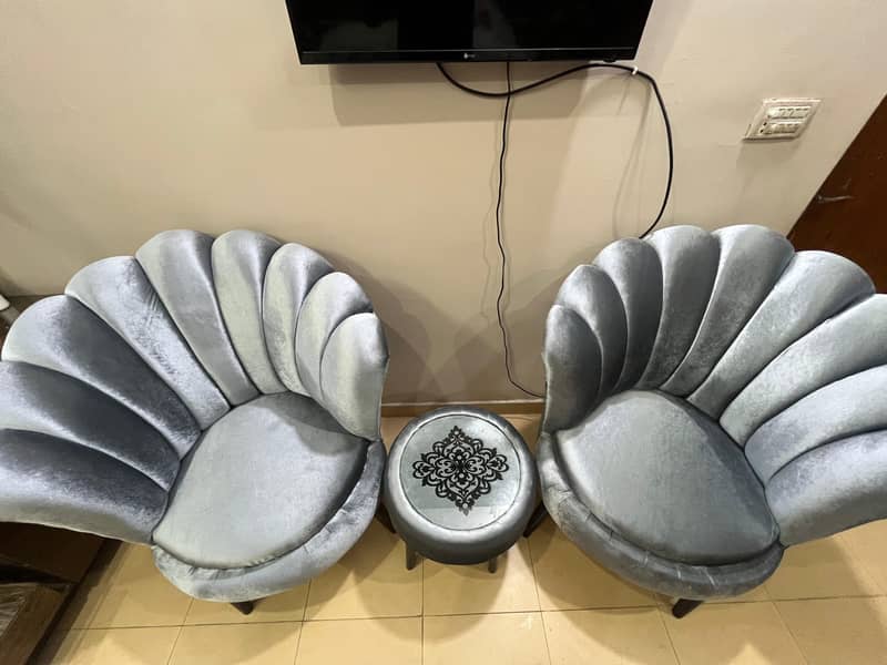 Two sofa chairs with cofee table 4