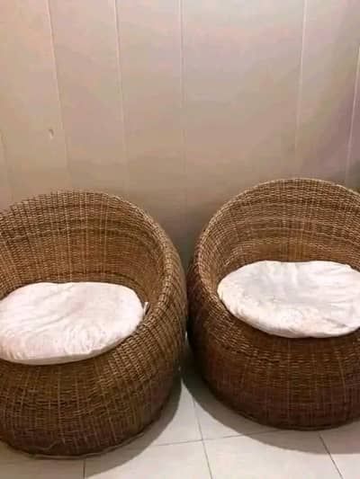 2 canes chairs with cushions