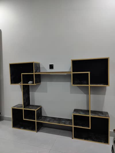 bed with 3 shelf wardrobe and LCD wall