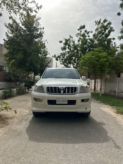 Toyota Prado Tx limited 2.7 petrol pearl white colour