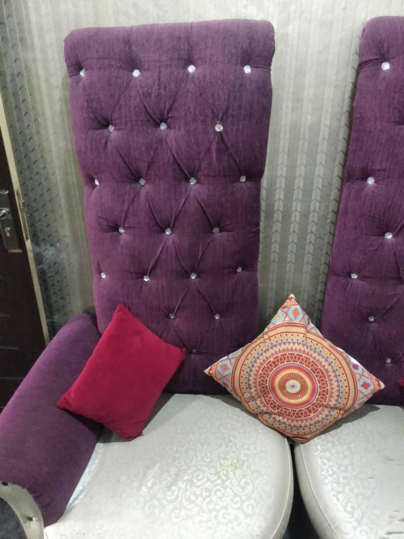 2 single sitter crown style long back sofas 1